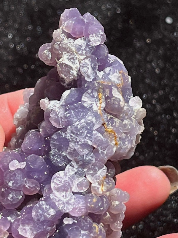 Side view of 161 gr grape agate display piece