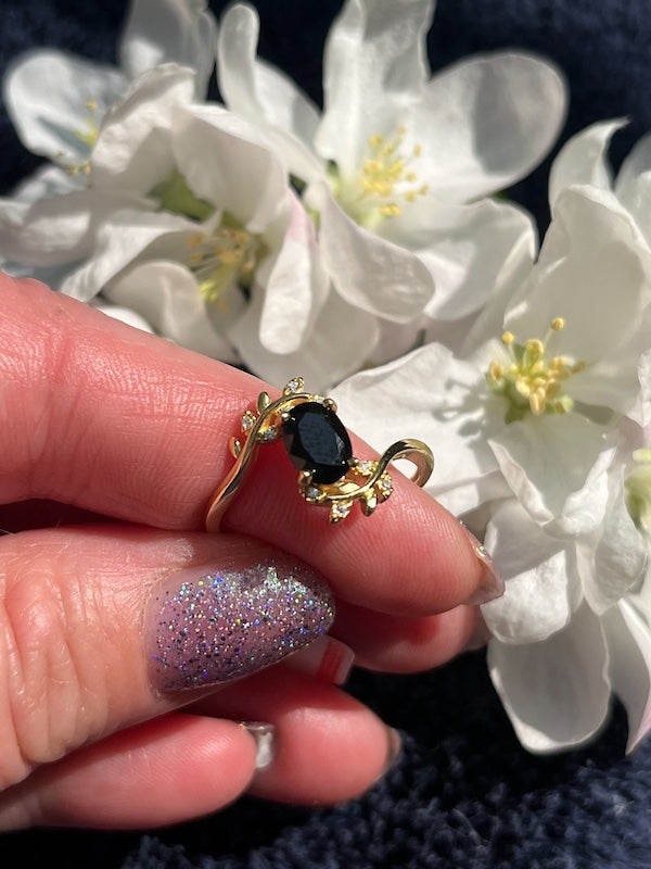 Ring, Black Spinel 5x7mm set in gold filled sterling silver. Size is adjustable