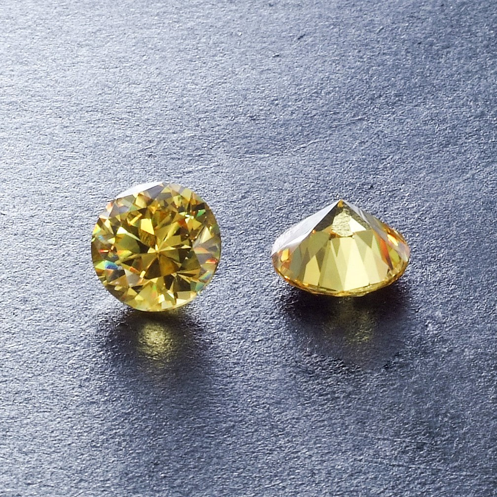 Cubic Zirconia Canary Yellow Round faceted stones - Various Sizes