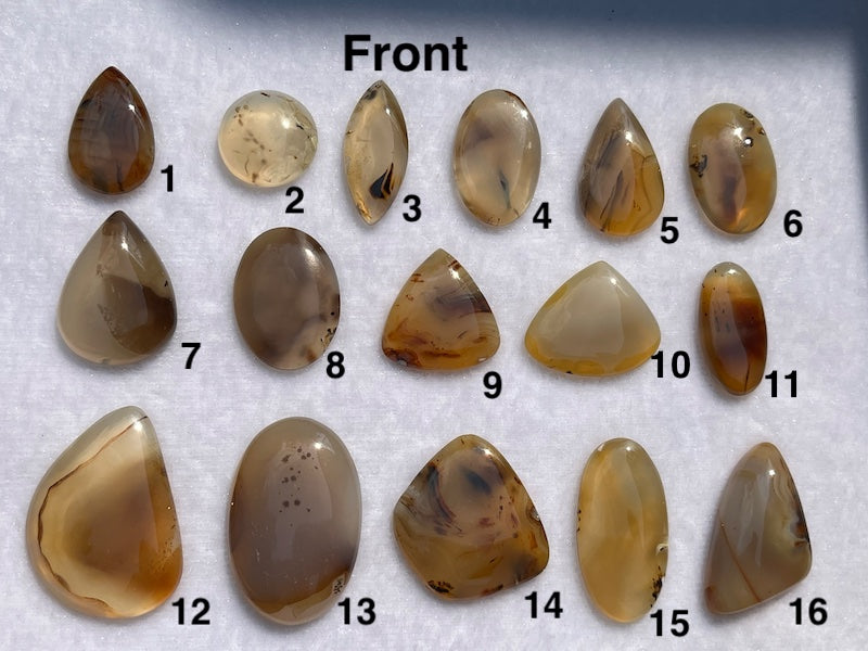 Multi coloured brown lace agate cabochons.