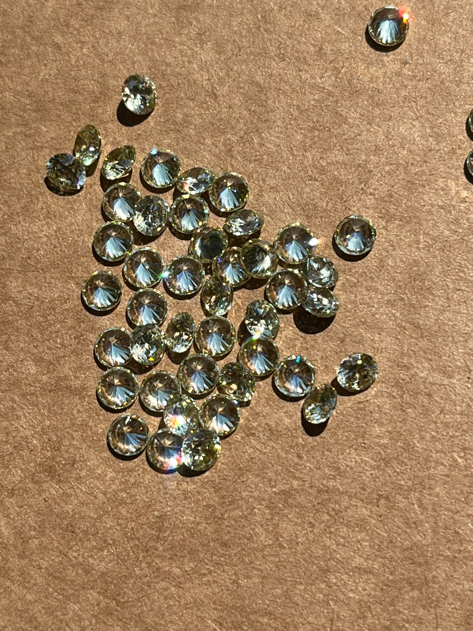 Yellow/Green Cubic Zirconias Round - Various Sizes