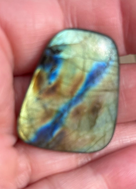 Labradorite Cabochons with Blue, orange, yellow and purple flash.