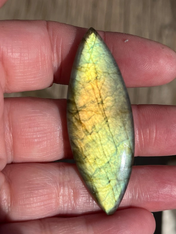 Labradorite Marquise/Eye Cabochons with vering Blue, orange, yellow and purple flash.