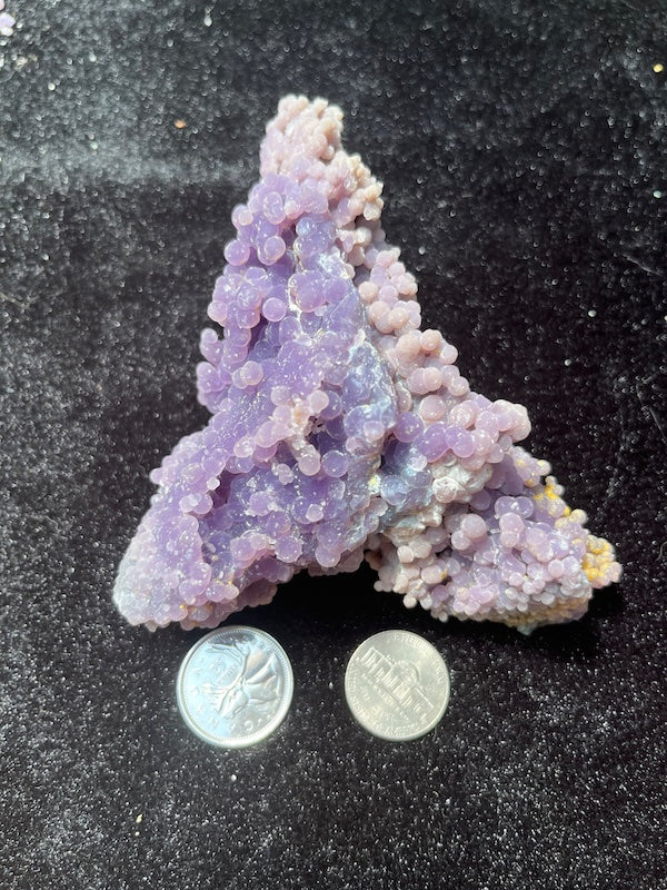 nice shades of purple on number 3 grape agate specimen compared to coins for size