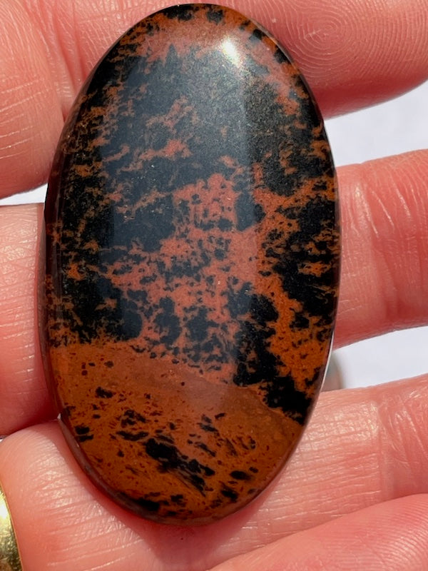 Mahogany Obsidian cabochons in a variety of sizes and shapes