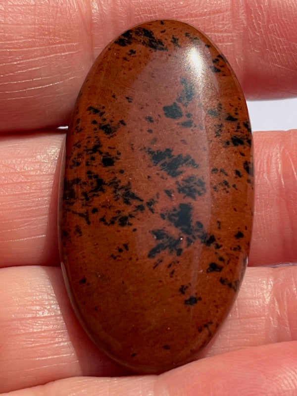 Mahogany Obsidian cabochons in a variety of sizes and shapes