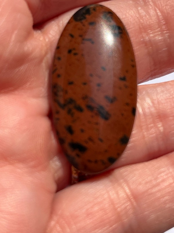 Mahogany Obsidian cabochons in a variety of sizes and shapes