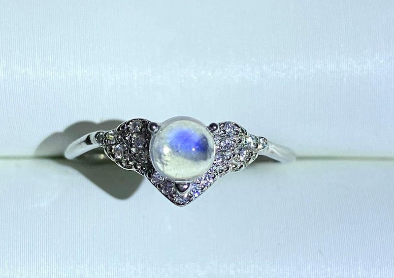 Ring, moonstone, CZ accent set in sterling silver, adjustable size.