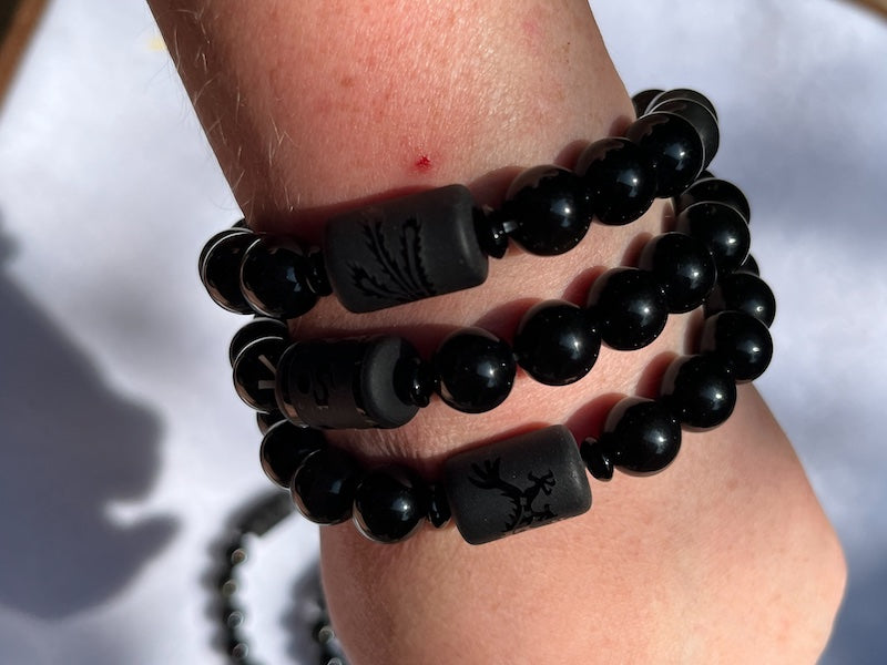 Bracelet, Rainbow Obsidian and 10 mm beads with long cylinder bead of phoenix or dragon