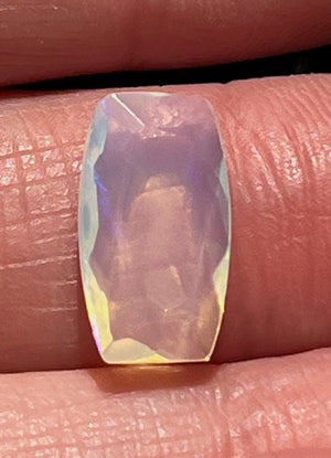 Opals, cushion rectangle shape, pink, blue and yellow flash.