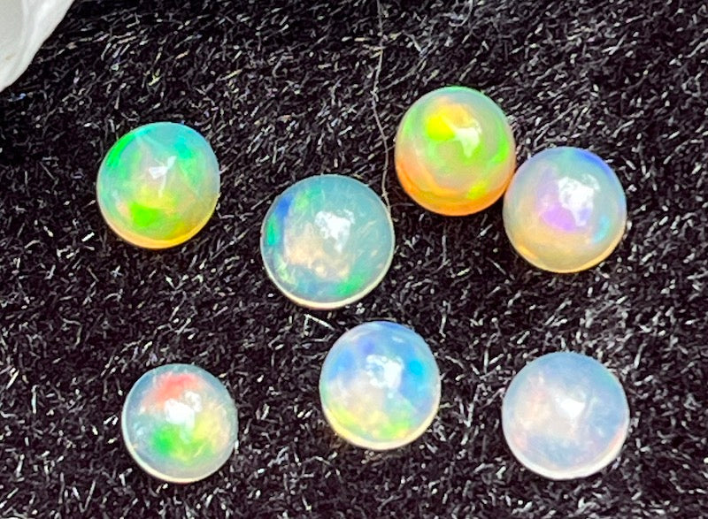 Opal round, Blue and yellow flash Cabochons 4, 5 & 6mm stones. Price is for 1