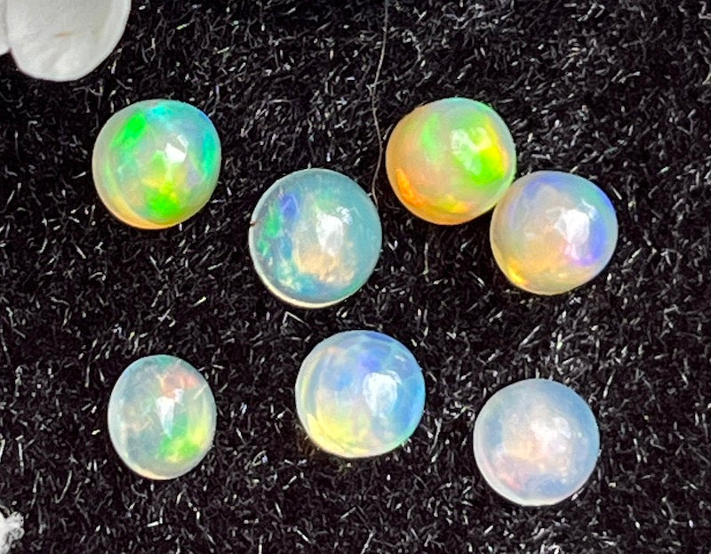 Opal round, Blue and yellow flash Cabochons 4, 5 & 6mm stones. Price is for 1