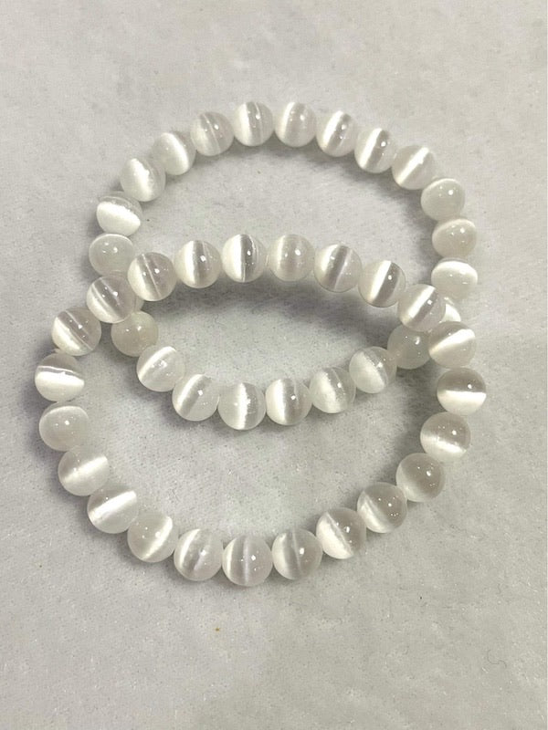 Bracelet, amazing cat's eye Selenite, 8.5 mm beads.