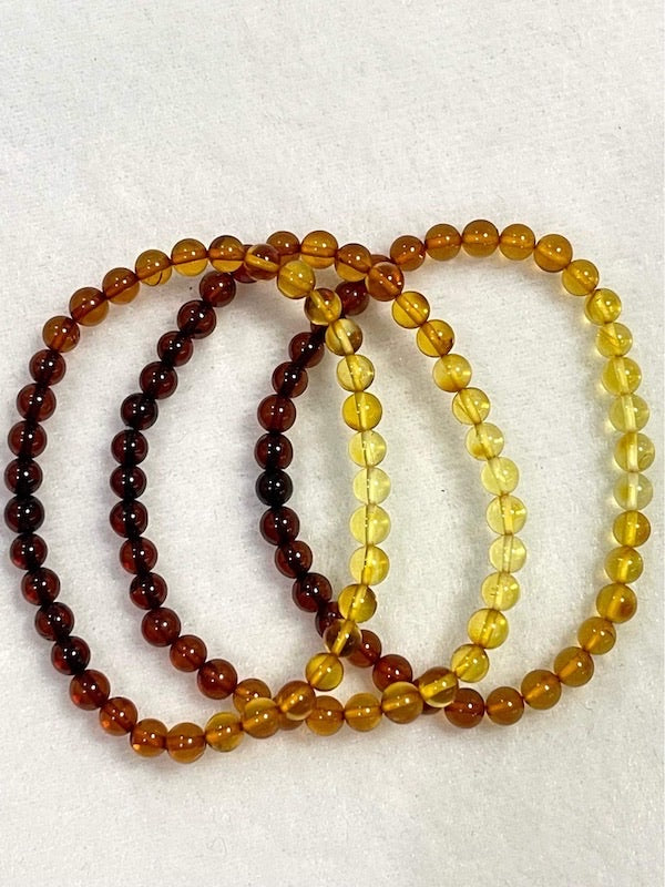 Bracelet, natural Amber round beads with full range of colours