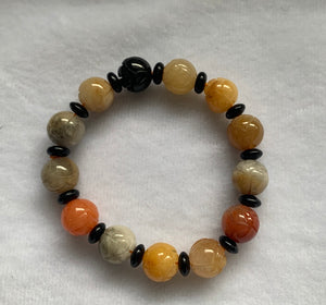 Bracelet, Different coloured Jade, lotus beads with onxy spacers