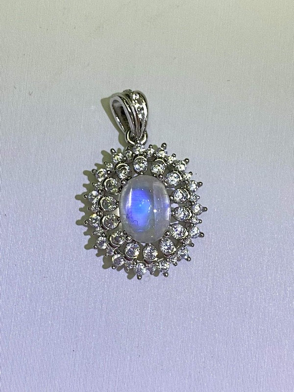 Pendant, moonstone, CZ accent set in sterling silver